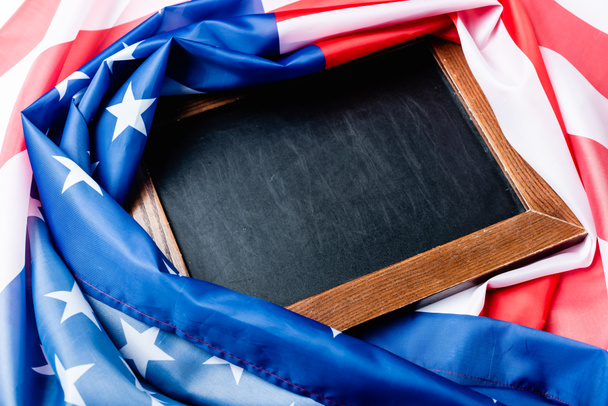 blank chalkboard near flag of american with stars and stipes  - Photo, Image