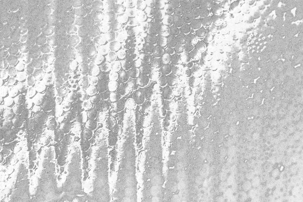 grijze grungy textuur met krassen en scheuren - Foto, afbeelding