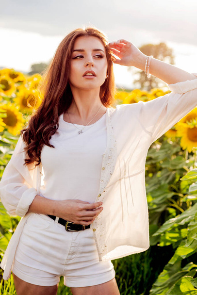 woman in the sunflower field - Photo, Image