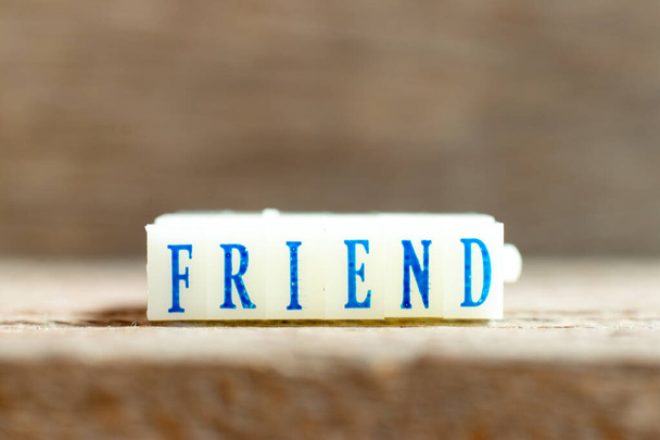 Letter block with blue color word friend on wood background - Photo, Image