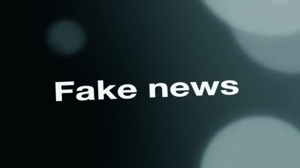 Τονισμένο Fake News τυπογραφία για τα κοινωνικά και ειδησεογραφικά μέσα ή έννοια μάρκετινγκ. 4k πλάνα. Μπορεί να χρησιμοποιηθεί ως επεξηγηματικό για ιστοσελίδες ή άλλους πόρους. - Πλάνα, βίντεο
