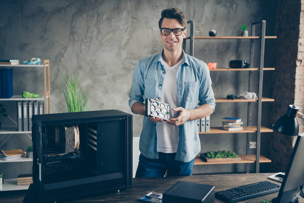 Portrait of his he nice attractive cheerful cheery confident professional guy geek technician repairing hardware company owner at modern loft industrial home office work place station - Foto, Bild