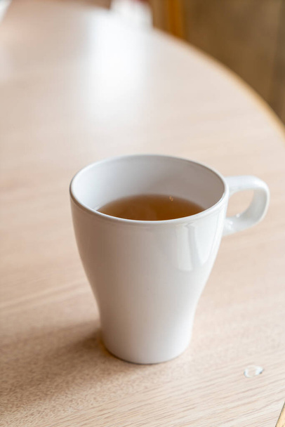 hot tea cup on table in restaurant - Φωτογραφία, εικόνα