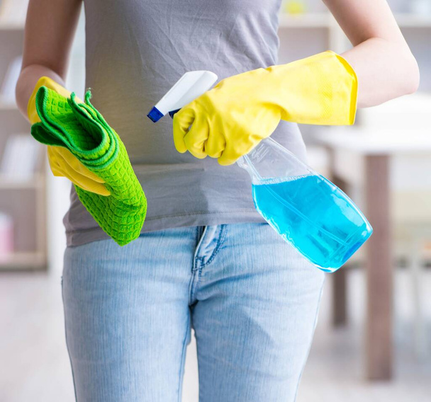 Woman doing cleaning at home - Fotó, kép