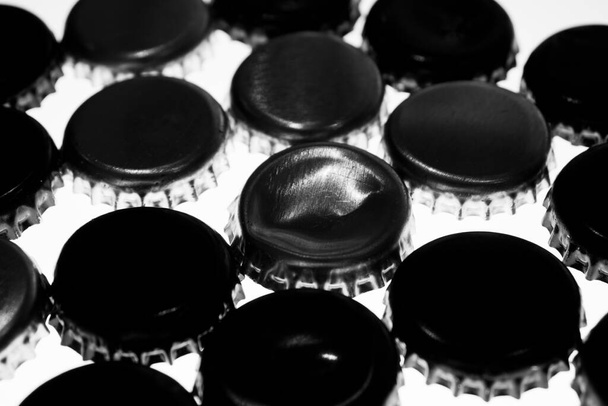 black beer caps on white background - Photo, image