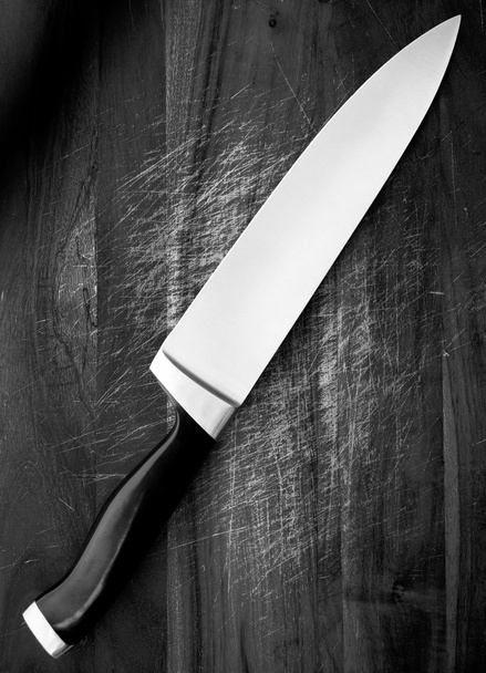Knife on Chopping Board - 写真・画像