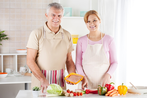 Senior Couple in the kitchen - Foto, afbeelding