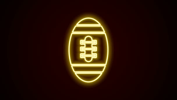 Icona luminosa al neon della linea American Football ball isolata su sfondo nero. Icona della palla da rugby. Gioco di squadra sport simbolo. Animazione grafica 4K Video motion - Filmati, video
