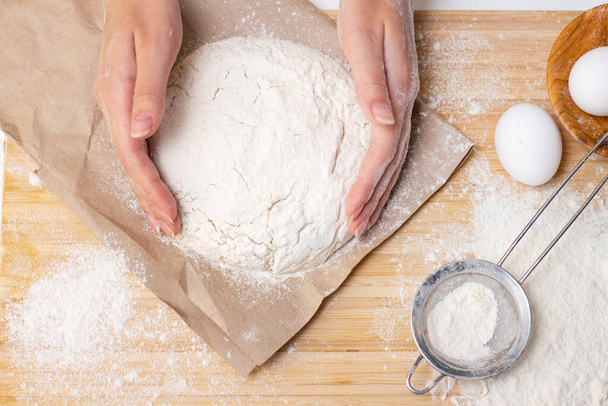 Female hands making pizza dough - Valokuva, kuva