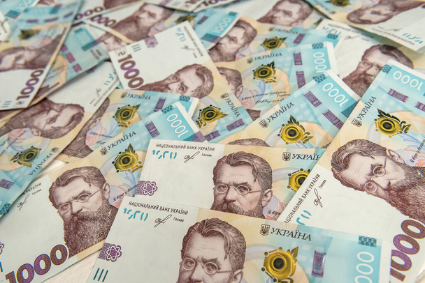 ¡UAH! Antecedentes del nuevo billete de 1000 de Ucrania. Mismo y dinero cocncept. Dinero ucraniano. - Foto, imagen