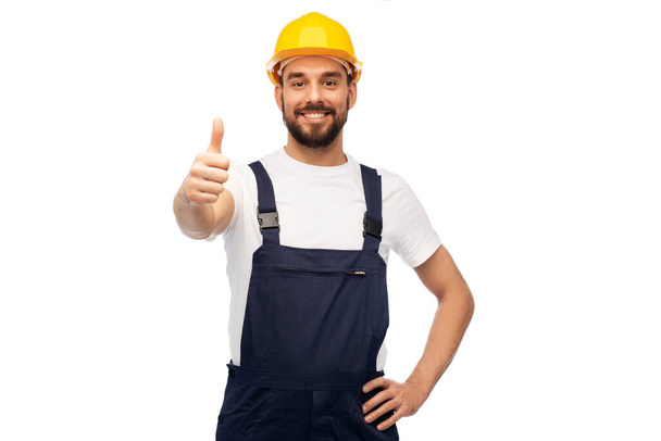 male worker or builder showing thumbs up - Fotografie, Obrázek