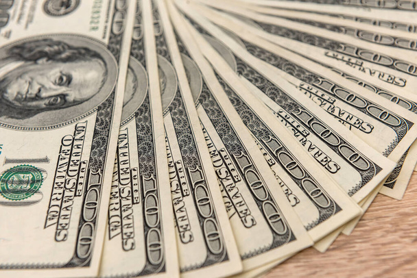 100 Amerikan doları banknot kusursuz doku ve tasarım için arka plan olarak. zenginlik tasarruf kavramı - Fotoğraf, Görsel