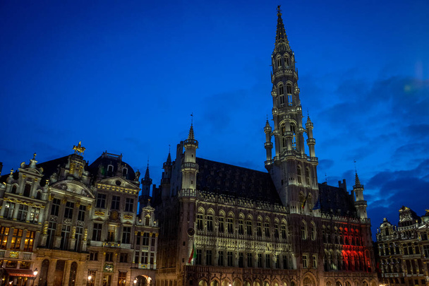 The palace of Brussels illuminated at night in market square at Brussels, Belgium, Europe at night - Photo, Image