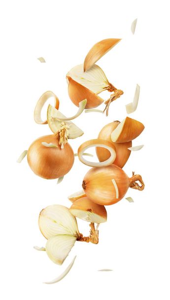 Onion cut and drops isolated on a white background - Foto, Imagen