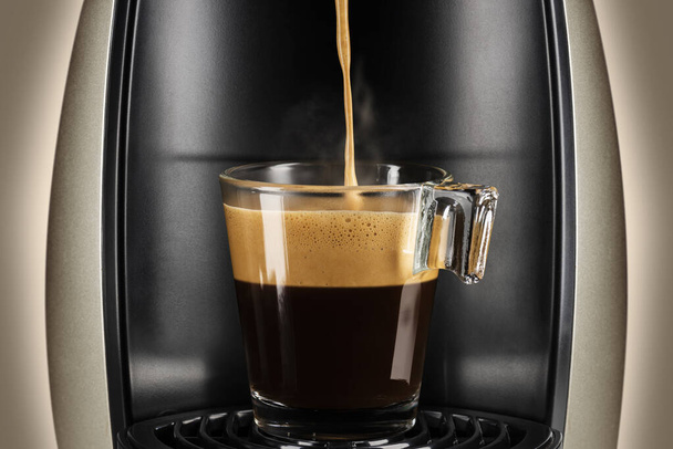 coffee maker filling a glass cup of coffee - Photo, Image
