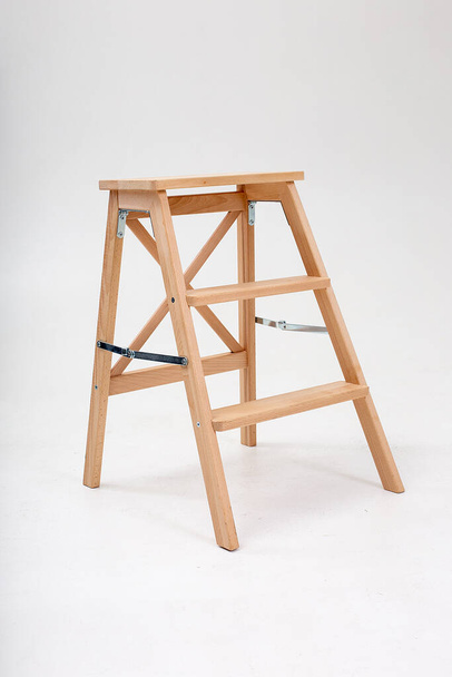 Wooden ladder in white emty room or on studio cyclorama with soft shadow - Photo, Image