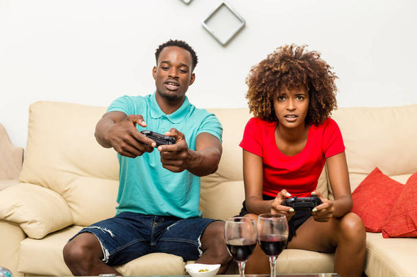 Black African American couple having fun playing video games - Fotoğraf, Görsel