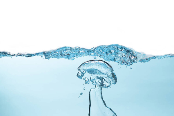 Air bubble and water splash,Water splash isolated on blue and white  background. - Foto, Imagem