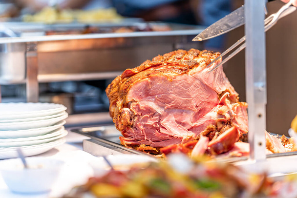 roast pork ham on a catering table. - Photo, image