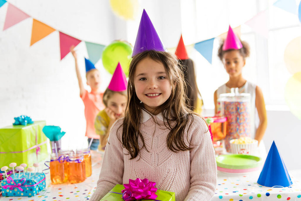 Group of adorable kids having fun at birthday party - Photo, Image