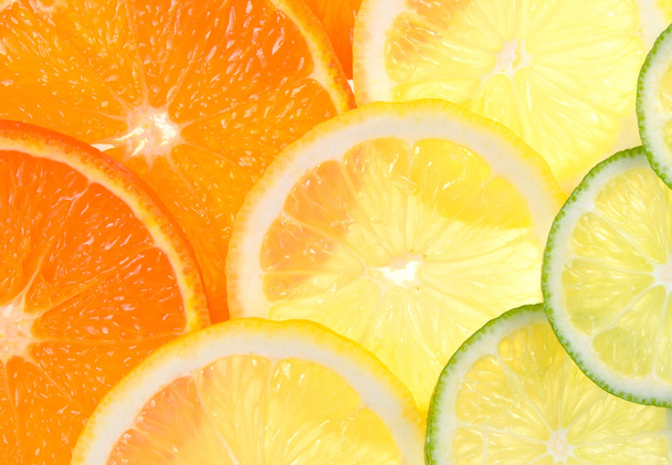 Slices of fresh citrus fruits  - Photo, Image