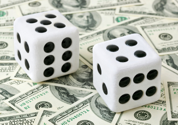 Two dices on money background - Foto, Imagem