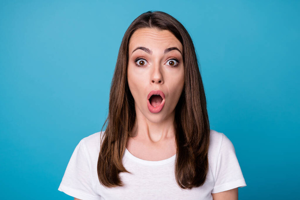 Photo of astonished girl impressed unexpected novelty shout open mouth wear casual style clothes isolated over blue color background - Φωτογραφία, εικόνα