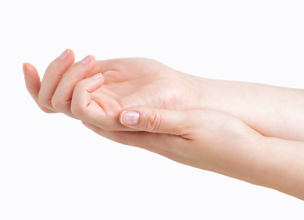Close up of beautiful woman hands rubbing with white background - Φωτογραφία, εικόνα