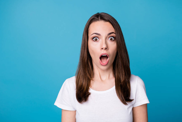 You must be kidding. Closeup photo of attractive shocked lady open mouth bad mood speechless listen awful terrible horrible news wear casual white t-shirt isolated blue color background - Fotoğraf, Görsel