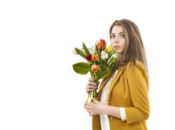 young woman with tulips isolated on a white background - Fotó, kép