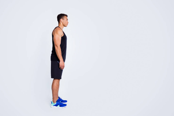 Full length body size profile side view of his he nice attractive content sportive guy visiting gym self development goal champion basketball player isolated over gray pastel color background - Foto, Bild