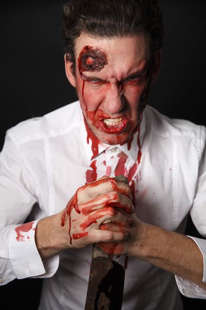 psychopaat met bloedige Trekmes - Foto, afbeelding