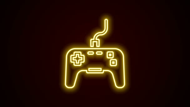 Glowing neon line Gamepad icon isolated on black background. Game controller. 4K Video motion graphic animation - Footage, Video