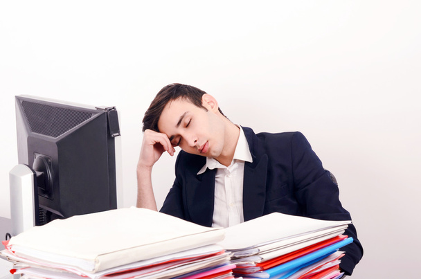 Tired business man sleeping at work. - Photo, Image