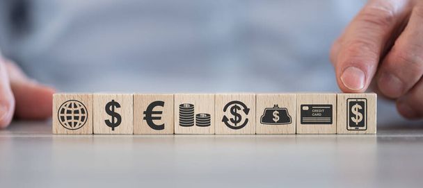 Concept of online banking with icons on wooden cubes - Фото, изображение