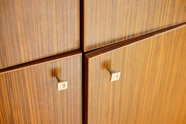 An abstract closeup high angle shot of furniture doors - Foto, Bild