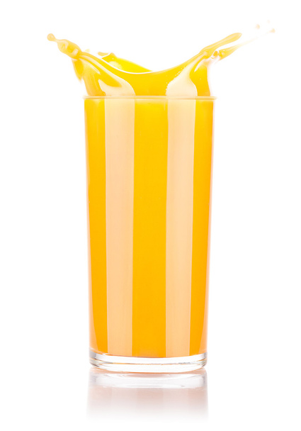 Fresh orange juice in glass with splash - Zdjęcie, obraz