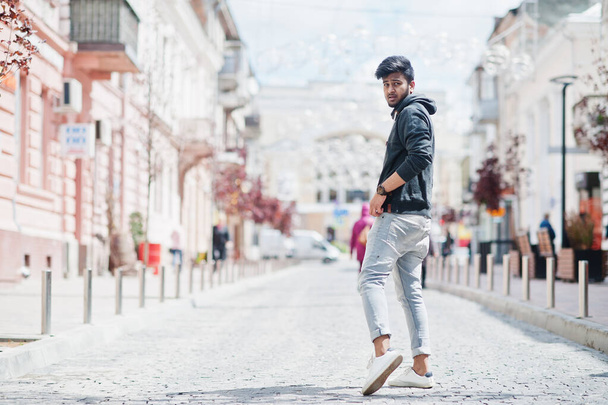 Portrait of young stylish indian man model pose in street. - Photo, Image