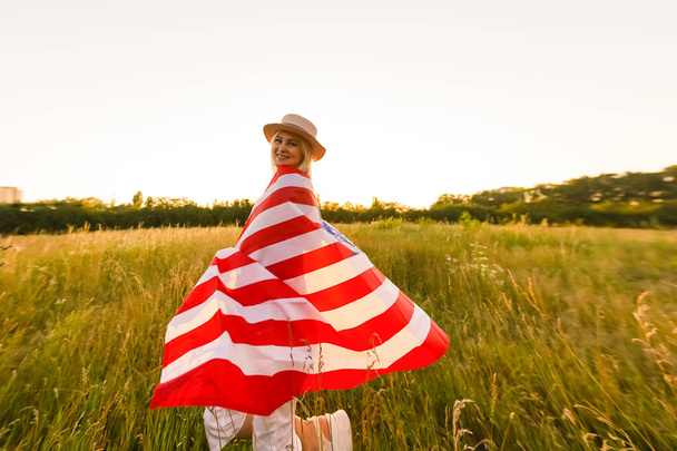 Beautiful Young Woman with USA Flag - Photo, image