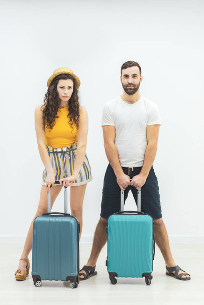 Young couple in love on their way to spend vacations abroad. - Photo, Image