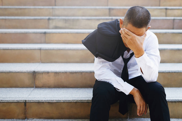 Stressed men get laid off because the economy is depressed. - Fotoğraf, Görsel