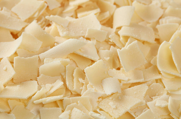 Parmesan flakes background closeup - Photo, Image