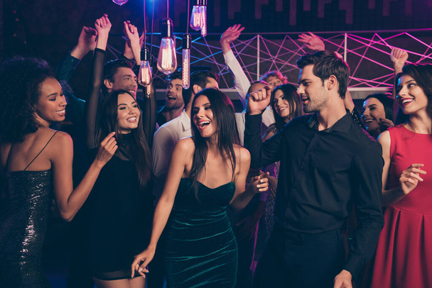 Photo portrait of excited people dancing together at fancy nightclub feeling good screaming laughing - Fotó, kép