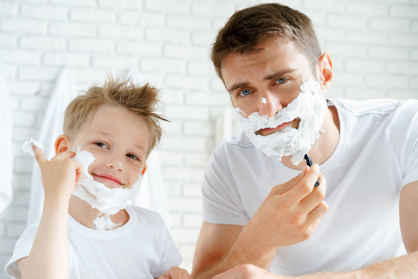 Father and his little son shaving together - Valokuva, kuva