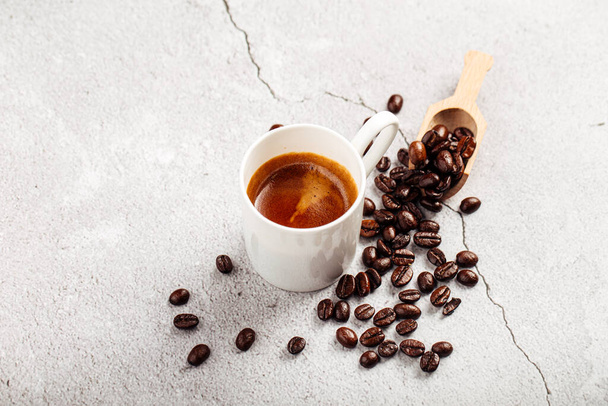 Brewed espresso coffee in a white mug - Photo, Image