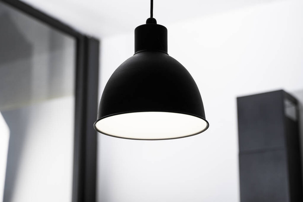 Industrial black look pendant lamps in a kitchen interior. Modern loft interior design. - Fotografie, Obrázek