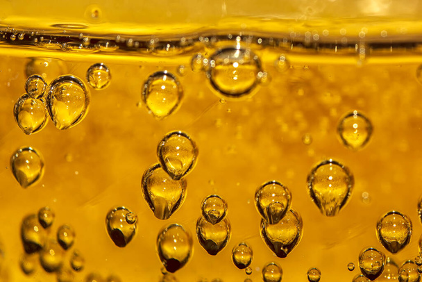 beautiful air bubbles in the drink. Close up - Fotó, kép