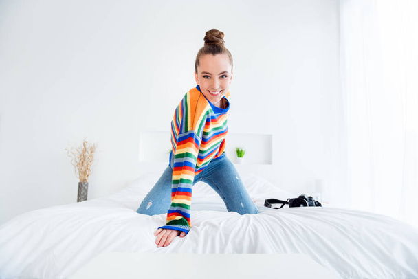 Photo of attractive lady good mood shooting pictures boyfriend posing on camera online date stand knees hand bed linen quarantine distancing casual outfit sheets bed room indoors - Fotografie, Obrázek
