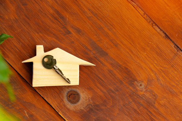 Wooden house model miniature and house keys - 写真・画像