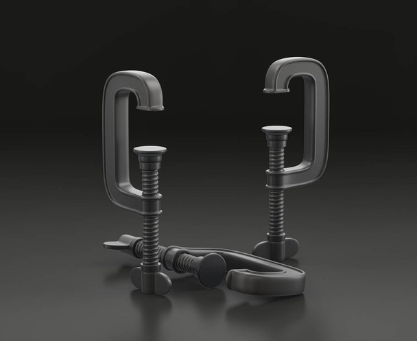Dark gray small clamp on black background, single color workshop and DIY tool, 3d rendering - Photo, Image